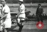 Image of Scenes from an annual Harvard and Yale rowing race on the Thames River New London Connecticut USA, 1900, second 26 stock footage video 65675063384