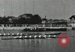 Image of Scenes from an annual Harvard and Yale rowing race on the Thames River New London Connecticut USA, 1900, second 35 stock footage video 65675063384