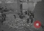 Image of search for survivors after Spanish Civil War bomb attack Spain, 1936, second 14 stock footage video 65675063415