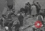 Image of search for survivors after Spanish Civil War bomb attack Spain, 1936, second 16 stock footage video 65675063415