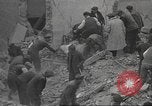 Image of search for survivors after Spanish Civil War bomb attack Spain, 1936, second 17 stock footage video 65675063415