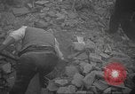 Image of search for survivors after Spanish Civil War bomb attack Spain, 1936, second 21 stock footage video 65675063415