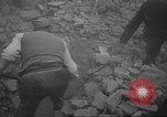 Image of search for survivors after Spanish Civil War bomb attack Spain, 1936, second 22 stock footage video 65675063415