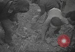Image of search for survivors after Spanish Civil War bomb attack Spain, 1936, second 24 stock footage video 65675063415