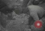 Image of search for survivors after Spanish Civil War bomb attack Spain, 1936, second 26 stock footage video 65675063415