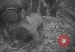 Image of search for survivors after Spanish Civil War bomb attack Spain, 1936, second 27 stock footage video 65675063415