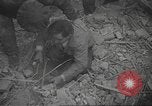 Image of search for survivors after Spanish Civil War bomb attack Spain, 1936, second 28 stock footage video 65675063415