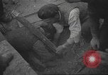 Image of search for survivors after Spanish Civil War bomb attack Spain, 1936, second 30 stock footage video 65675063415