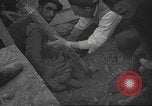 Image of search for survivors after Spanish Civil War bomb attack Spain, 1936, second 31 stock footage video 65675063415