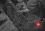 Image of search for survivors after Spanish Civil War bomb attack Spain, 1936, second 32 stock footage video 65675063415