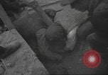 Image of search for survivors after Spanish Civil War bomb attack Spain, 1936, second 36 stock footage video 65675063415
