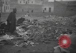 Image of search for survivors after Spanish Civil War bomb attack Spain, 1936, second 51 stock footage video 65675063415