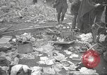 Image of search for survivors after Spanish Civil War bomb attack Spain, 1936, second 55 stock footage video 65675063415