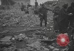 Image of search for survivors after Spanish Civil War bomb attack Spain, 1936, second 56 stock footage video 65675063415