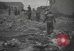 Image of search for survivors after Spanish Civil War bomb attack Spain, 1936, second 61 stock footage video 65675063415
