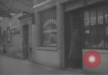 Image of Russian emigre neighborhood shops Paris France, 1937, second 23 stock footage video 65675063450