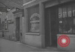 Image of Russian emigre neighborhood shops Paris France, 1937, second 24 stock footage video 65675063450