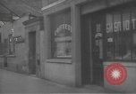 Image of Russian emigre neighborhood shops Paris France, 1937, second 25 stock footage video 65675063450