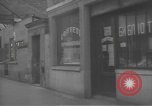 Image of Russian emigre neighborhood shops Paris France, 1937, second 26 stock footage video 65675063450