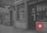 Image of Russian emigre neighborhood shops Paris France, 1937, second 27 stock footage video 65675063450