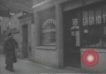 Image of Russian emigre neighborhood shops Paris France, 1937, second 29 stock footage video 65675063450