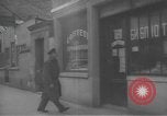 Image of Russian emigre neighborhood shops Paris France, 1937, second 30 stock footage video 65675063450