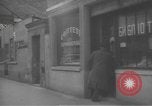 Image of Russian emigre neighborhood shops Paris France, 1937, second 32 stock footage video 65675063450