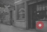 Image of Russian emigre neighborhood shops Paris France, 1937, second 34 stock footage video 65675063450