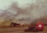 Image of B-18 aircraft burning after Japanese attack on Pearl Harbor Pearl Harbor Hawaii USA, 1941, second 50 stock footage video 65675063479