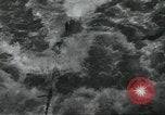 Standbild USA airmen Pacific Theater, 1943, aus Sekunde 31 historischem Filmmaterial Videoclip 65675063489