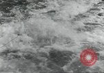 Standbild USA airmen Pacific Theater, 1943, aus Sekunde 53 historischem Filmmaterial Videoclip 65675063489
