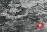 Standbild USA airmen Pacific Theater, 1943, aus Sekunde 54 historischem Filmmaterial Videoclip 65675063489