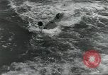 Standbild USA airmen Pacific Theater, 1943, aus Sekunde 55 historischem Filmmaterial Videoclip 65675063489