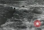 Standbild USA airmen Pacific Theater, 1943, aus Sekunde 56 historischem Filmmaterial Videoclip 65675063489