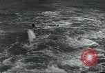 Standbild USA airmen Pacific Theater, 1943, aus Sekunde 57 historischem Filmmaterial Videoclip 65675063489