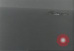 Standbild USA airmen Pacific Theater, 1943, aus Sekunde 60 historischem Filmmaterial Videoclip 65675063489