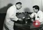 Standbild Techniker United States USA, 1954, aus Sekunde 62 historischem Filmmaterial Videoclip 65675063494
