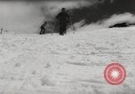 Image of skiing in spring Argentina, 1960, second 24 stock footage video 65675063694