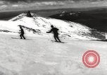 Image of skiing in spring Argentina, 1960, second 28 stock footage video 65675063694