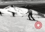 Image of skiing in spring Argentina, 1960, second 29 stock footage video 65675063694