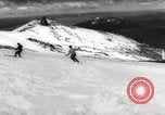 Image of skiing in spring Argentina, 1960, second 30 stock footage video 65675063694