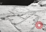 Image of skiing in spring Argentina, 1960, second 33 stock footage video 65675063694