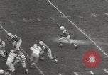 Image of Football game Baltimore Maryland USA, 1960, second 9 stock footage video 65675063696