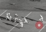 Image of Football game Baltimore Maryland USA, 1960, second 19 stock footage video 65675063696