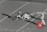 Image of Football game Baltimore Maryland USA, 1960, second 20 stock footage video 65675063696