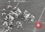 Image of Football game Baltimore Maryland USA, 1960, second 27 stock footage video 65675063696