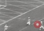 Image of Football game Baltimore Maryland USA, 1960, second 32 stock footage video 65675063696