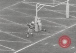 Image of Football game Baltimore Maryland USA, 1960, second 33 stock footage video 65675063696
