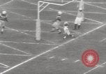 Image of Football game Baltimore Maryland USA, 1960, second 34 stock footage video 65675063696