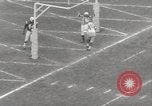 Image of Football game Baltimore Maryland USA, 1960, second 35 stock footage video 65675063696